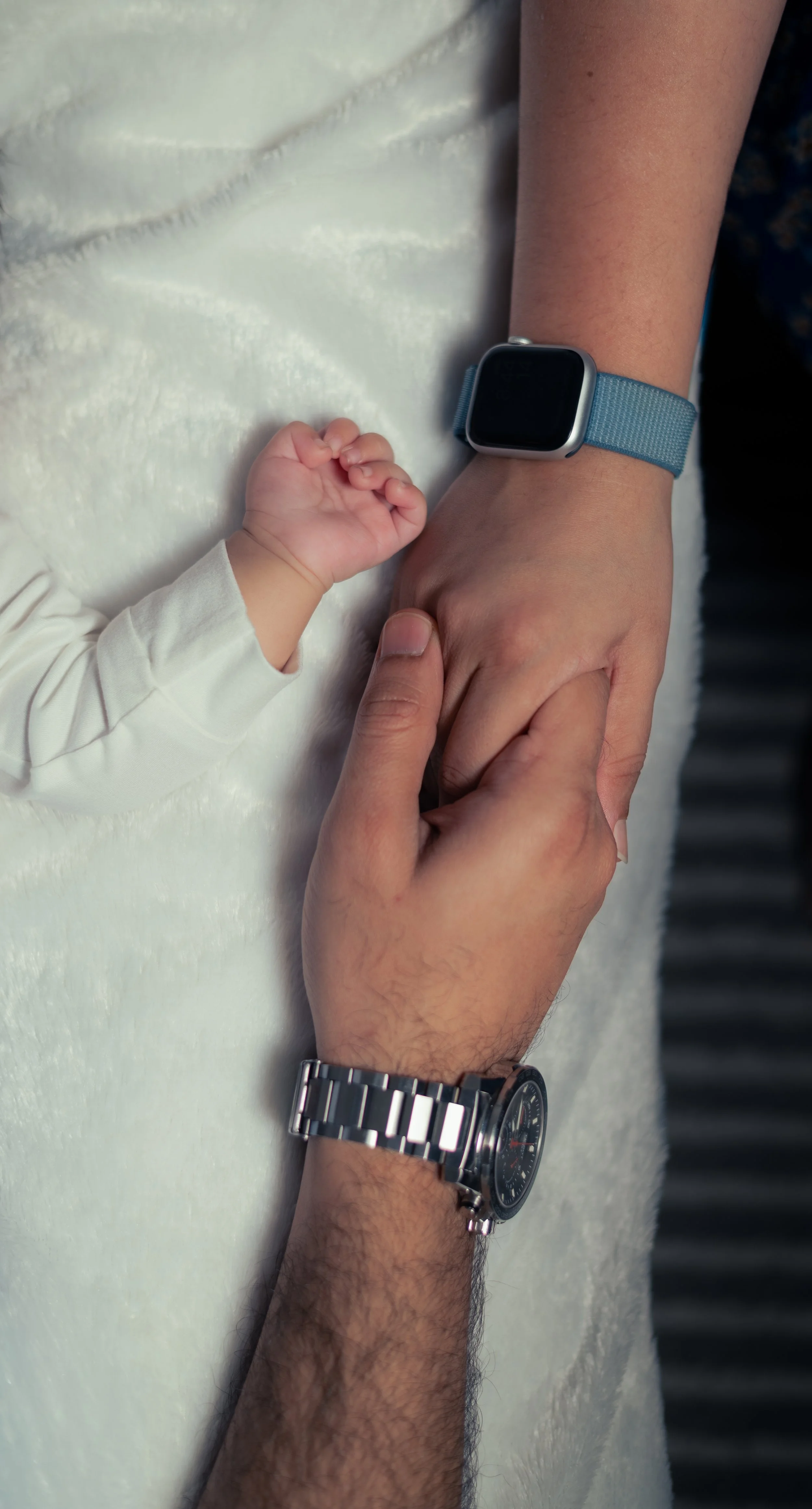 Newborn baby gripping father's arm - bonding moment | Family & Newborn Photography Kitchener Ontario by Abhijeet Bhullar