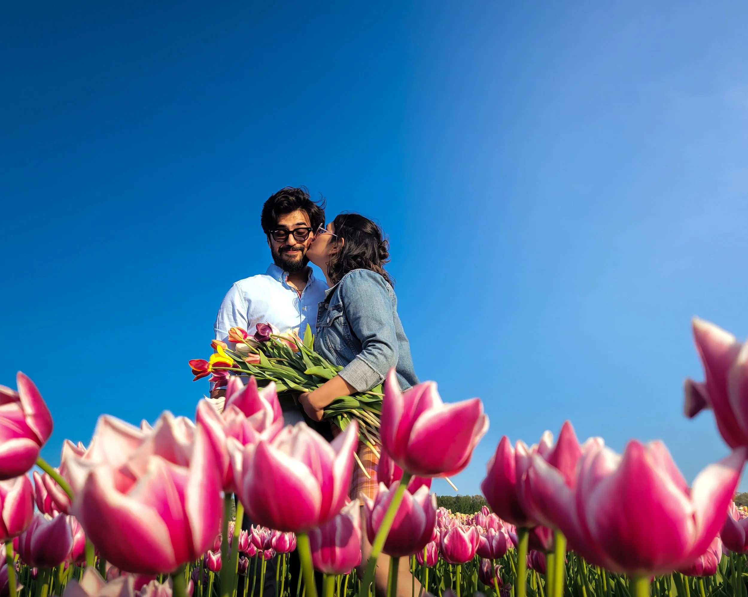 Pre-wedding couple photography Kitchener Ontario tulip field by Abhijeet Bhullar