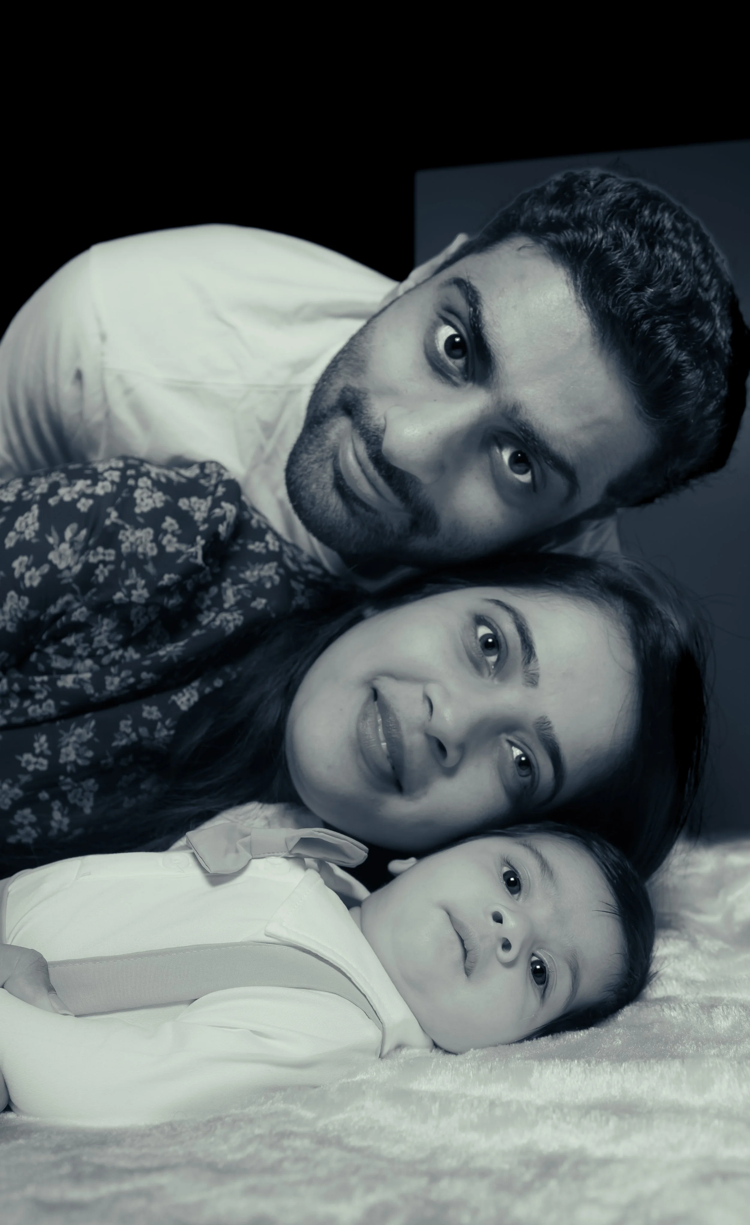 Black and white family portrait - parents and newborn baby | Family Photography Kitchener Ontario by Abhijeet Bhullar