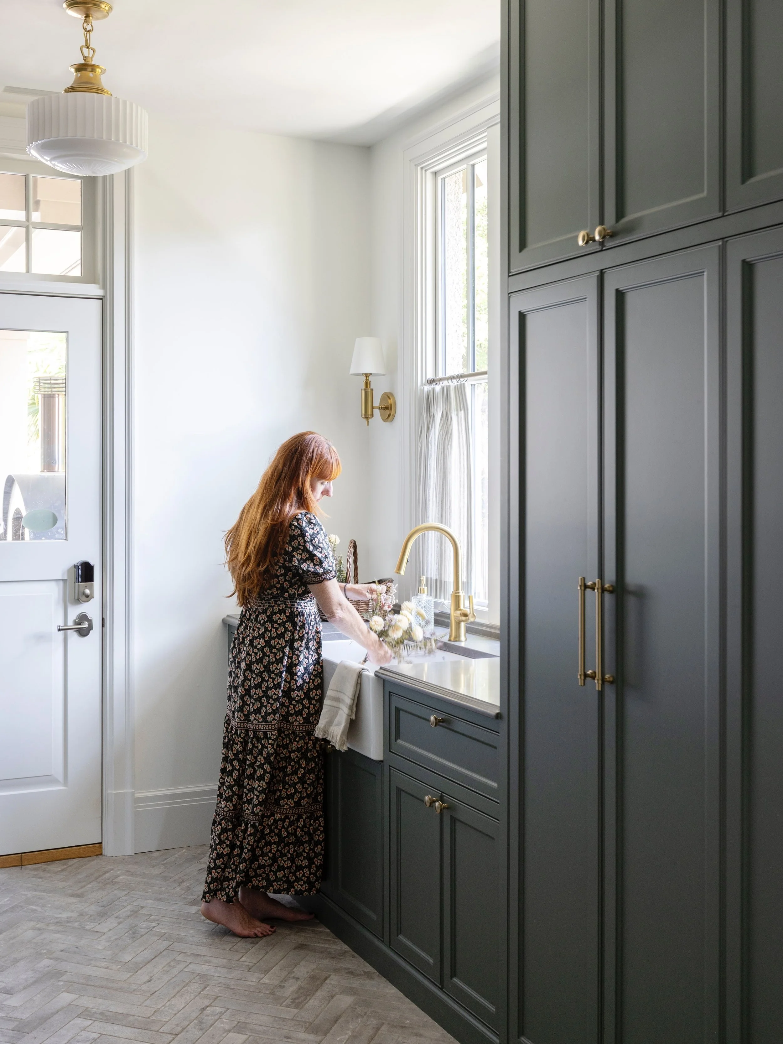 The mudroom doesn&rsquo;t have to be an afterthought. This well used space provides all the function and storage for a busy young family, but helps keep things tidy and looking good. 
A farmhouse sink anchors the room, giving a peek into the tranquil