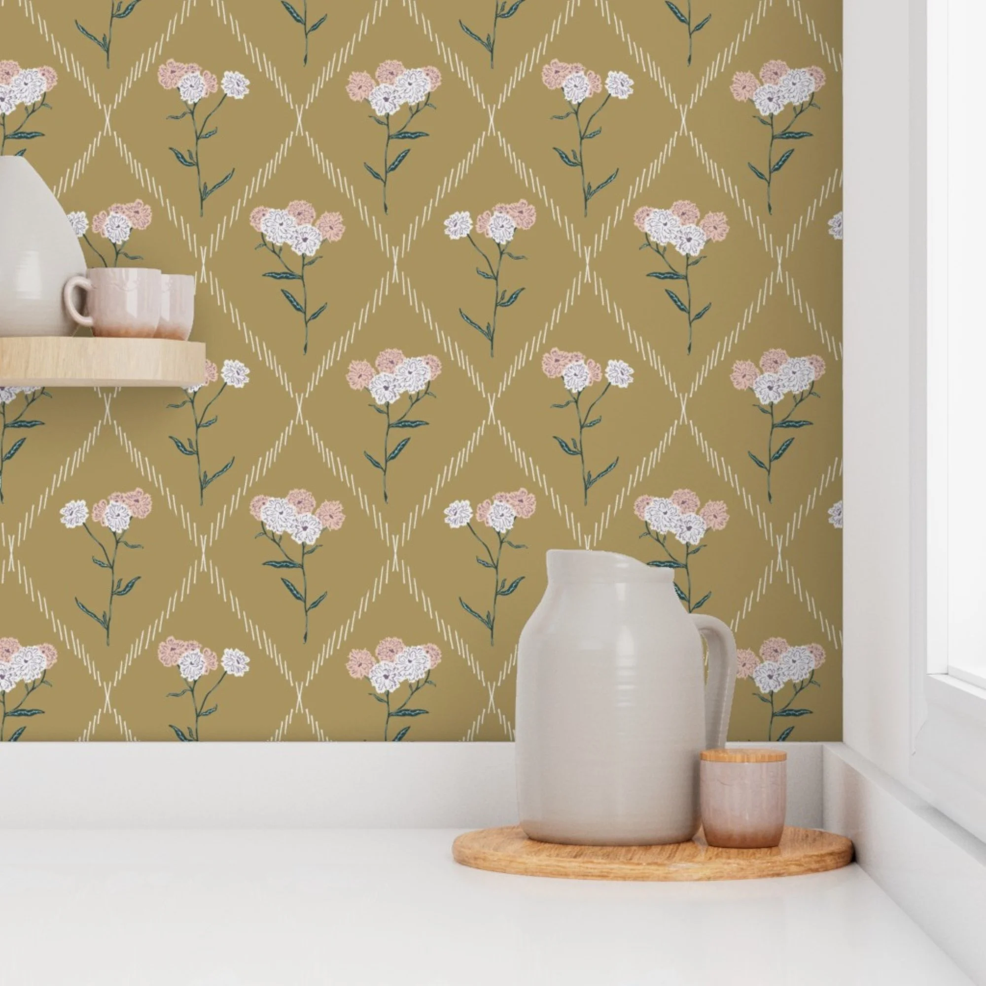 A wall with yellow wallpaper decorated with a floral and diamond pattern, a wooden shelf holding a white vase and pink mugs, and two pink vases on a wooden tray.