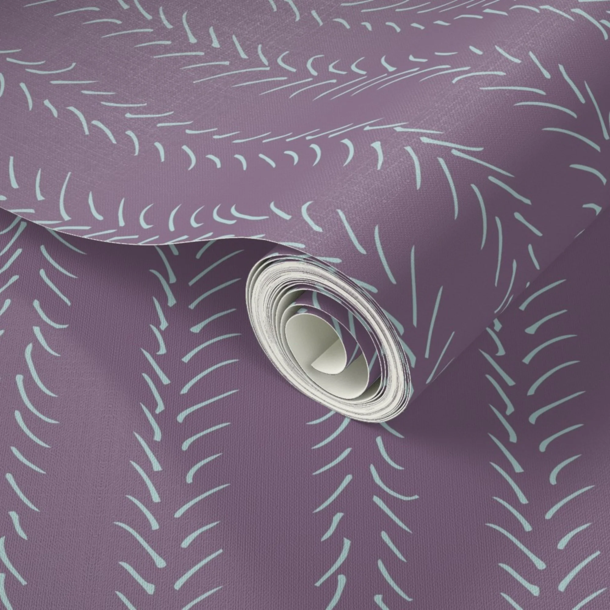 Close-up of a rolled-up sheet of purple wallpaper with light teal hand drawn chevron striped line patterns.