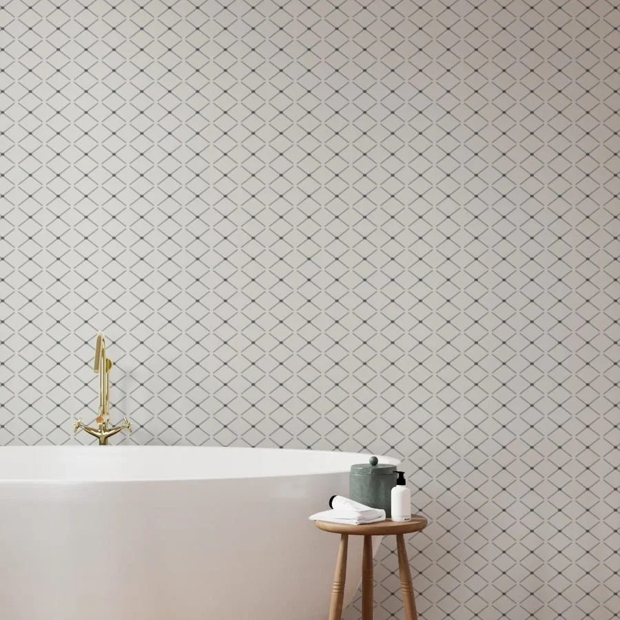 A minimalist broken diamond grid of gray lines anchored by dark charcoal points on a cream background.