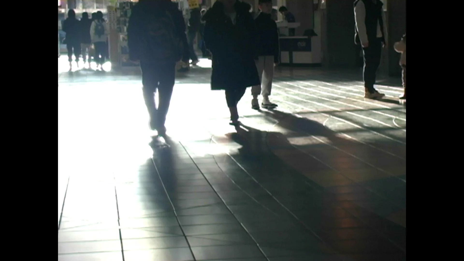 Shadows walking in mall.jpg
