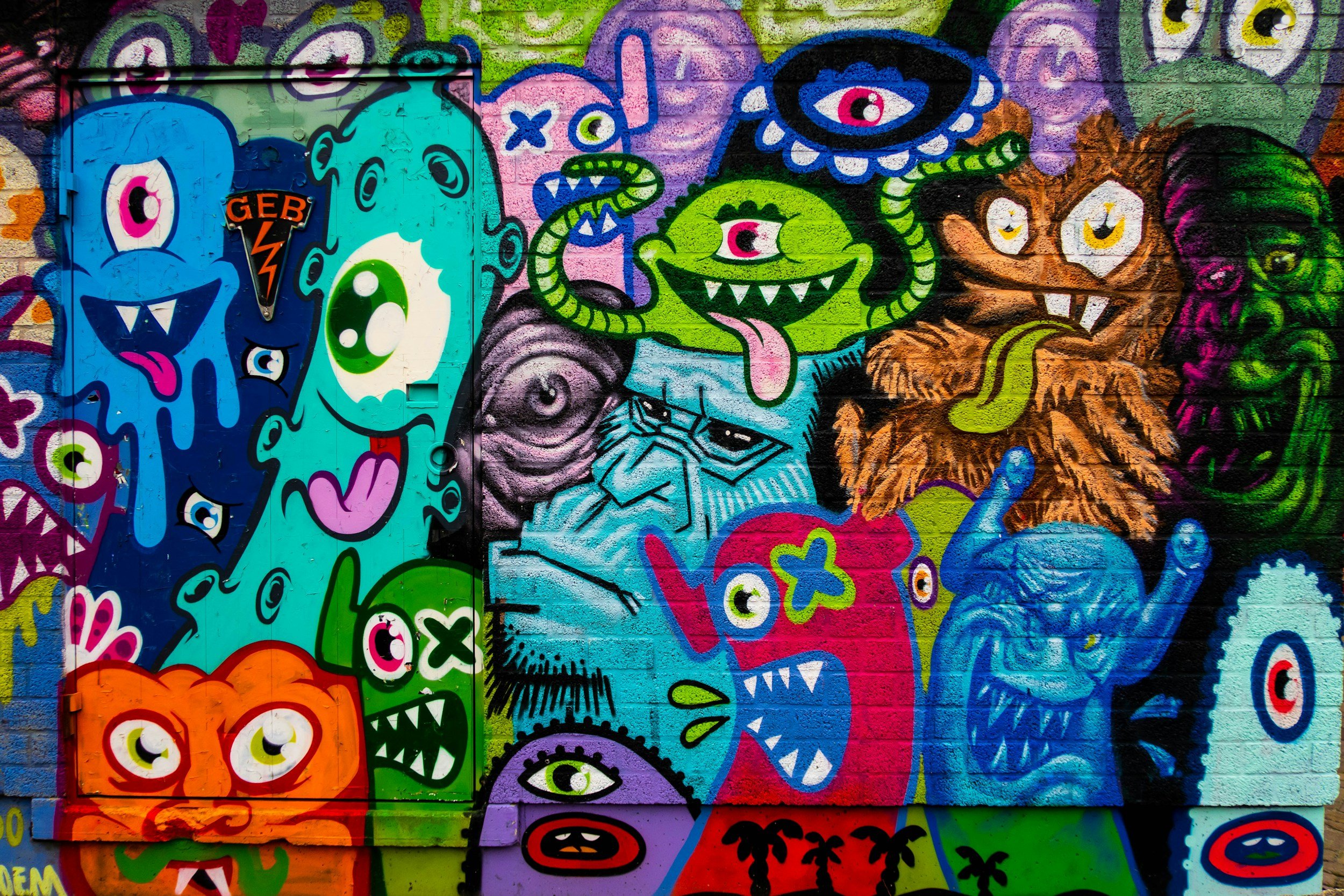 Colorful graffiti mural representing the more complex web design packages available with Blue Crow Digital