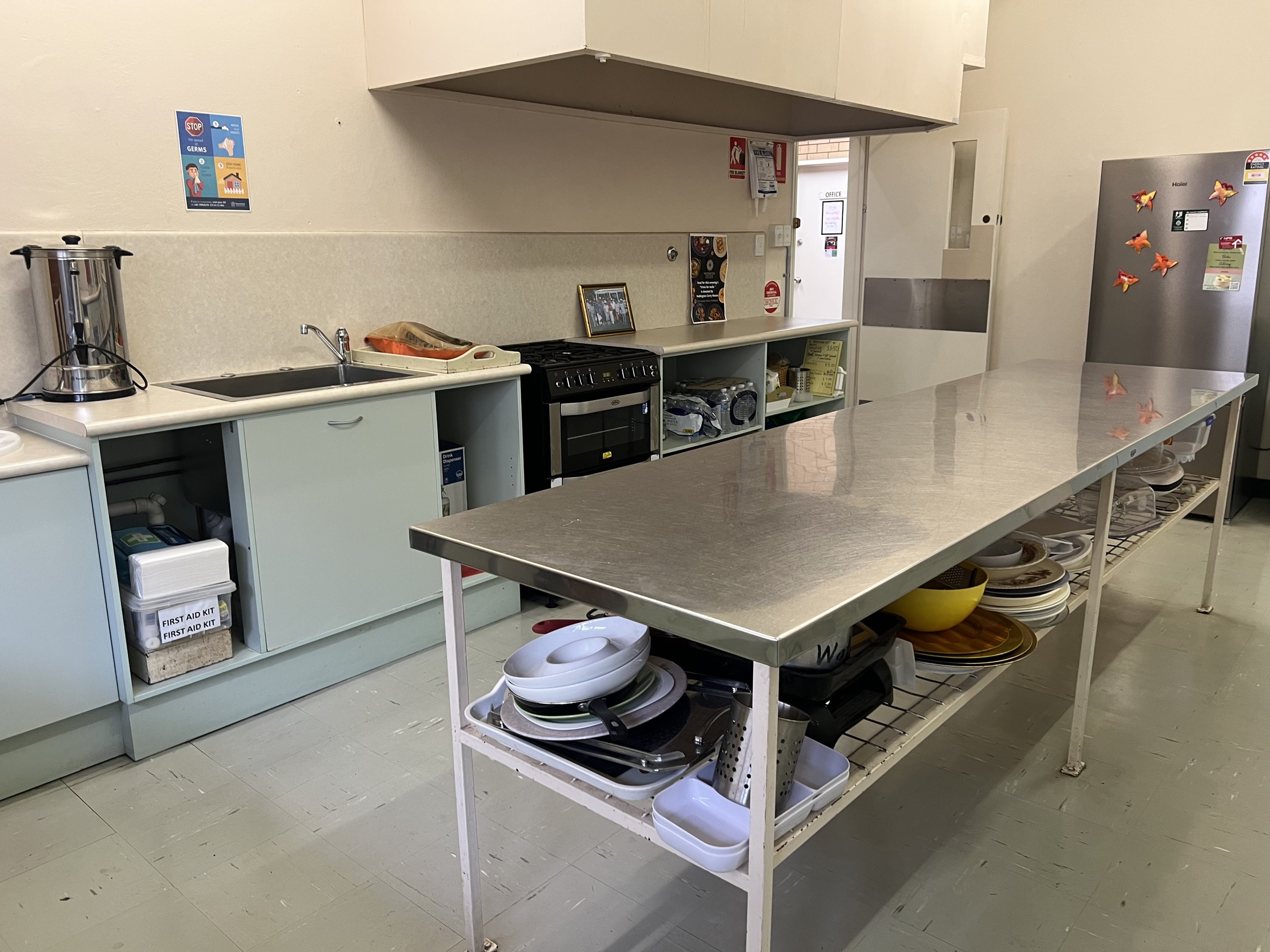 BrisWest Centre Kitchen / Cafe - stainless steel bench, fridge and gas stove/oven