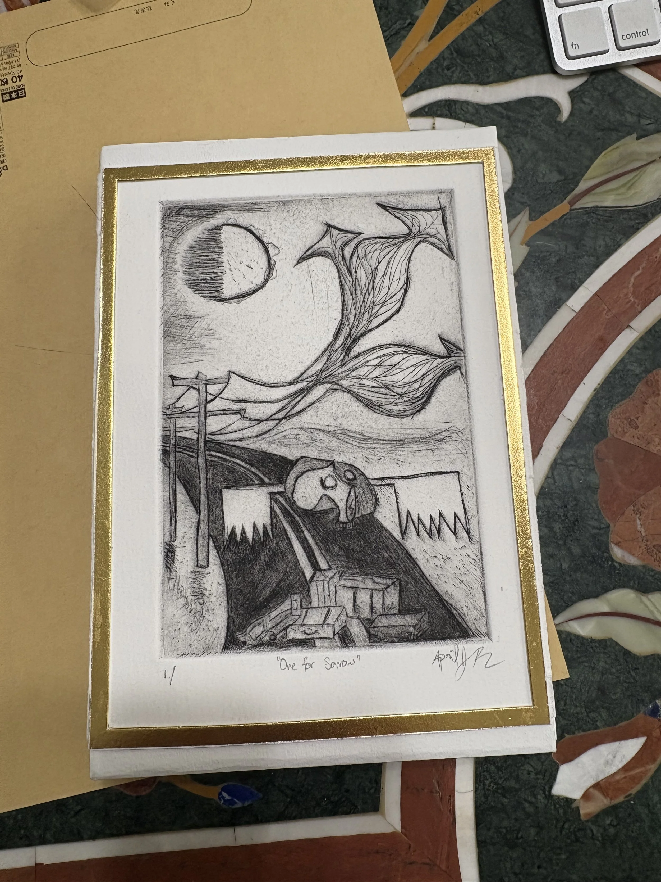 A black and white sketch titled 'One for sorrow,' featuring a moon, flying fish, a skull, railroad tracks, and a landscape with hills and power lines.