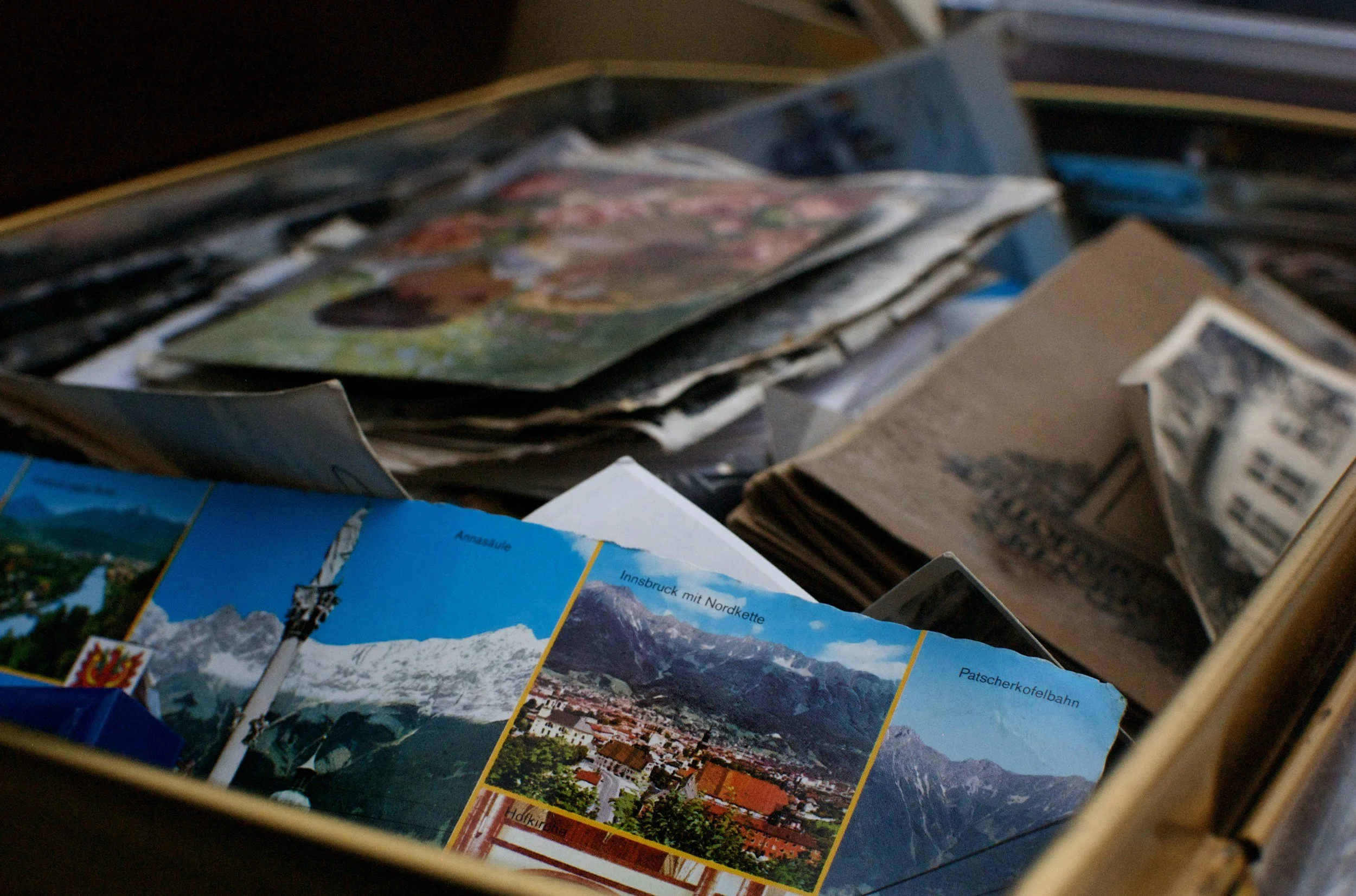 Box of loose photos to organize