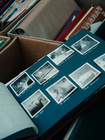 boxes of vintage photo albums