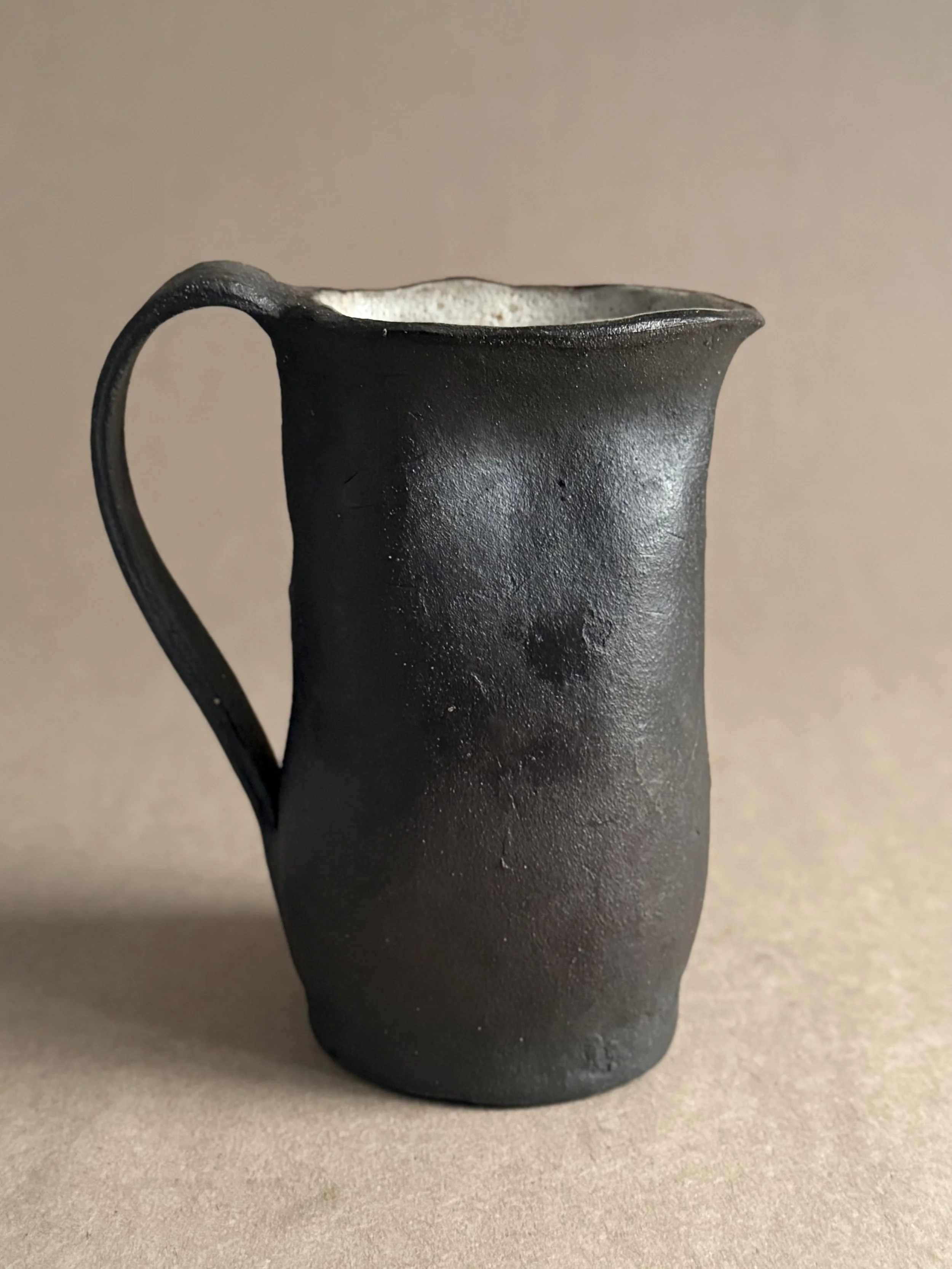 $65 - 6 inch pitcher 