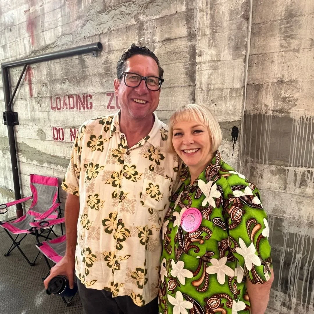 Portland couple wearing colorful Hawaiian shirts