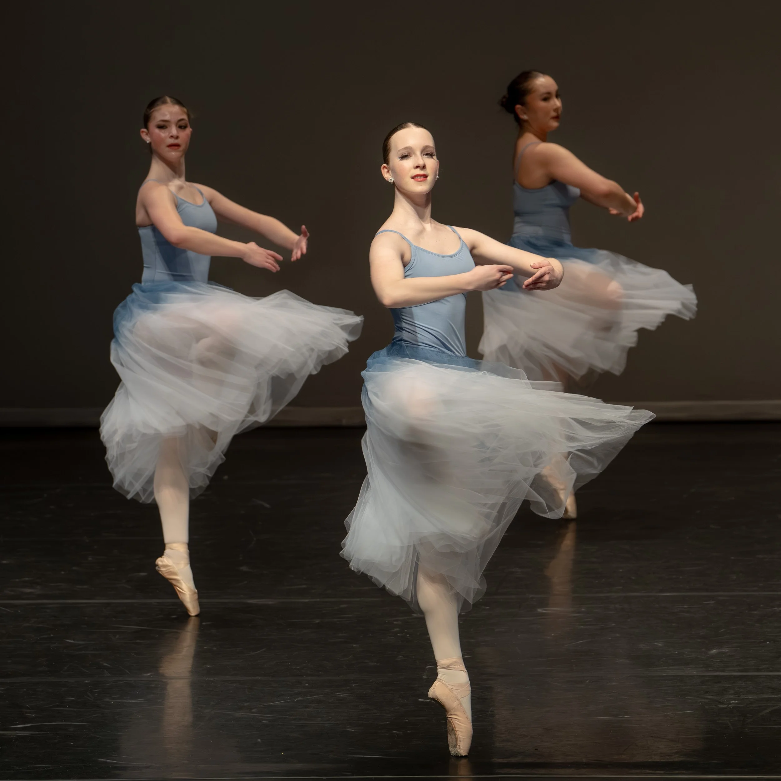 Group of ballet dancers performing en pointe at Tri-City Dance Centre.