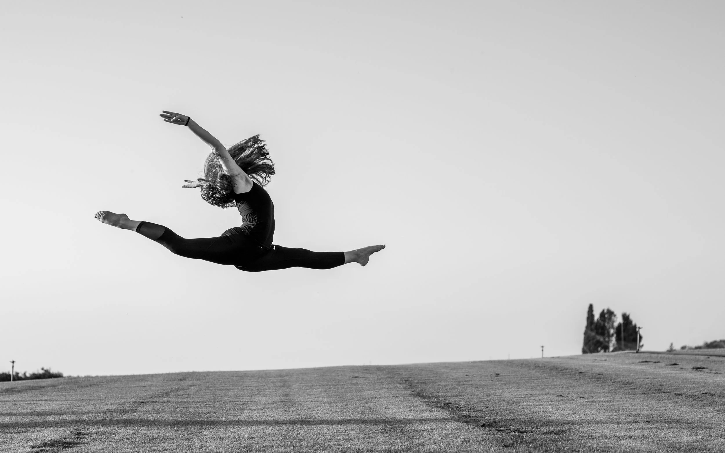 Dynamic dance performance showcasing grace, movement, and precision. Professional performing arts photography by Peak Action.