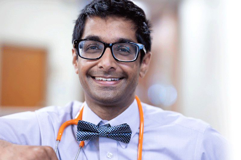 Headshot of Dr. Krish Subrahmanian smiling