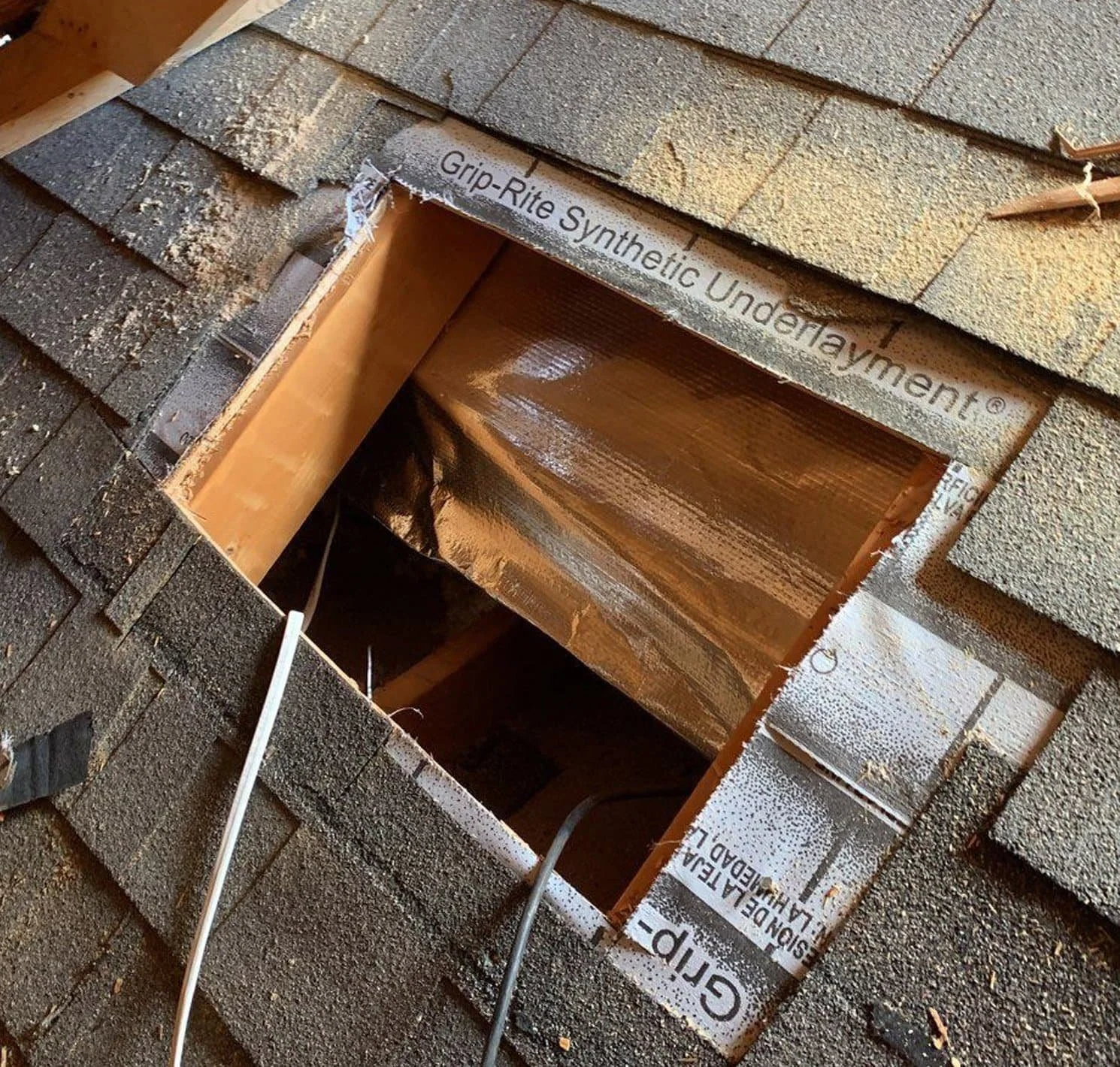 broken roof being repaired by triumph roofing