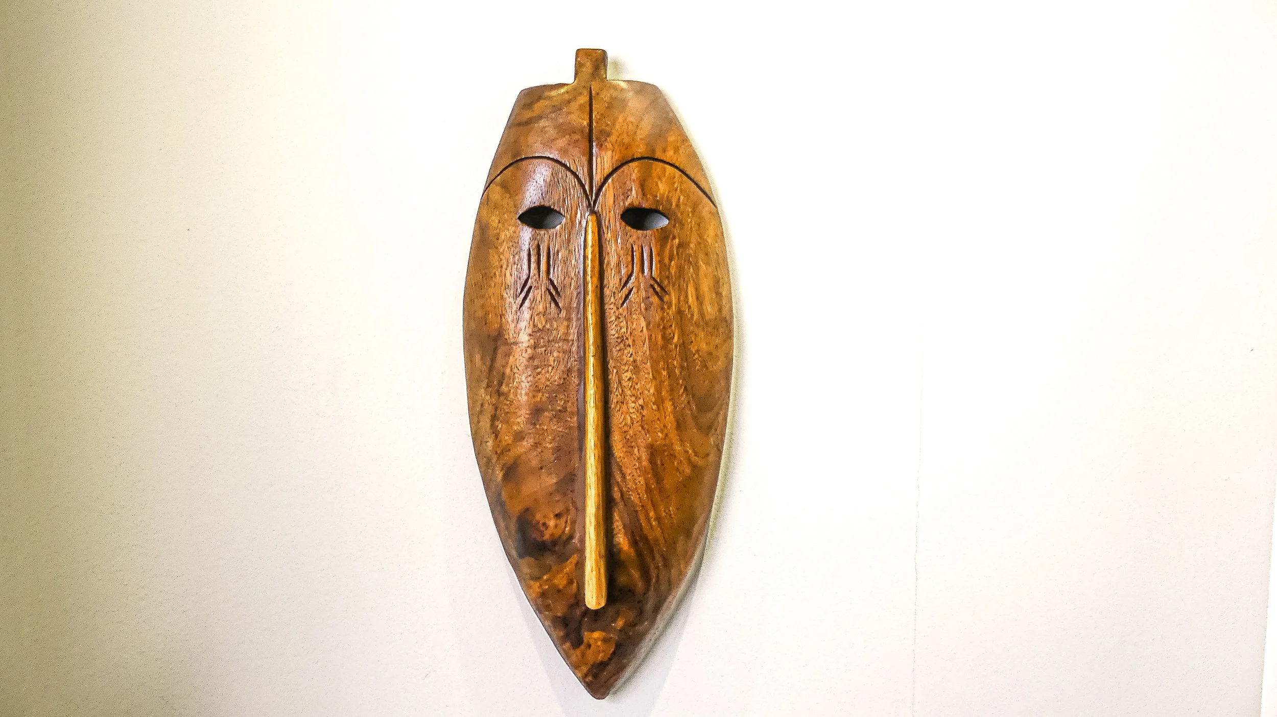 Hand carved Elongated Oval African Wooden Tribal Mask