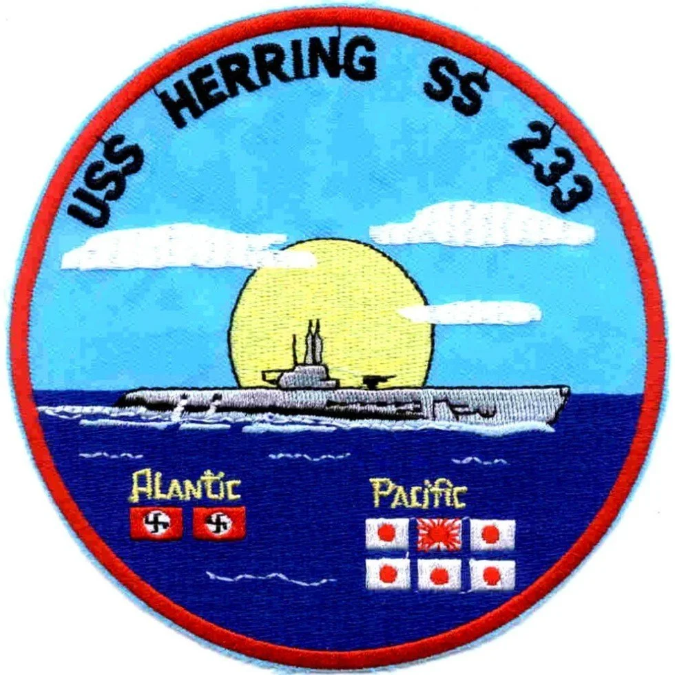 In June 1944, the Gato-class submarine USS Herring (SS-233) carried out a daring attack against Japanese shipping near Matsuwa Island in the Kuril Islands. After successfully sinking enemy vessels, Herring was struck by Japanese coastal artillery and