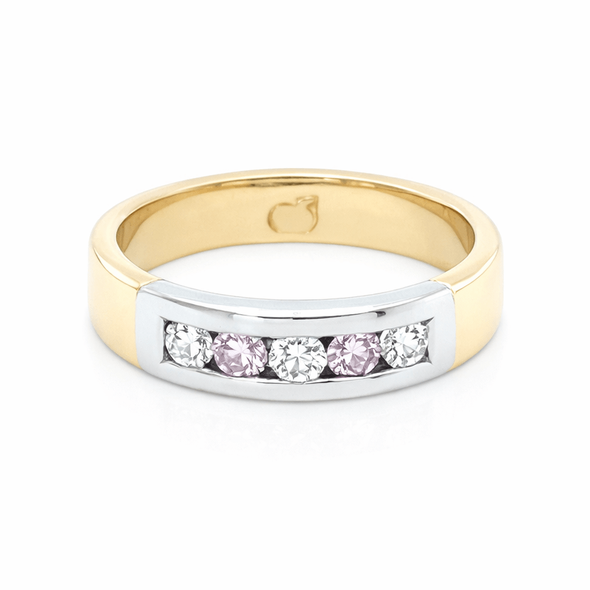 Pink and white diamond wedding ring set in yellow and white gold.