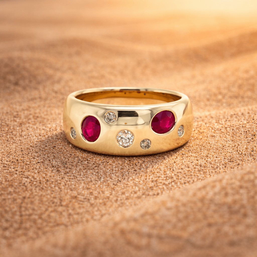 Ruby and diamond dress ring set in yellow gold.