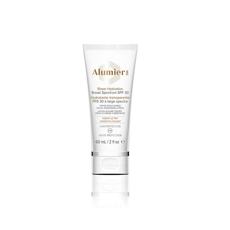 A tube of Alumier skincare product, Sheer Hydration Broad Spectrum SPF 30, tinted moisturizer with high protection, 60 mL/2 fl oz.
