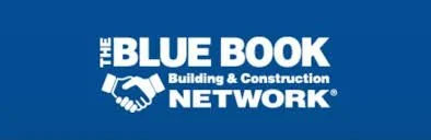 Cover of 'The Blue Book Building & Construction Network' with blue background and white text, featuring a handshake icon.