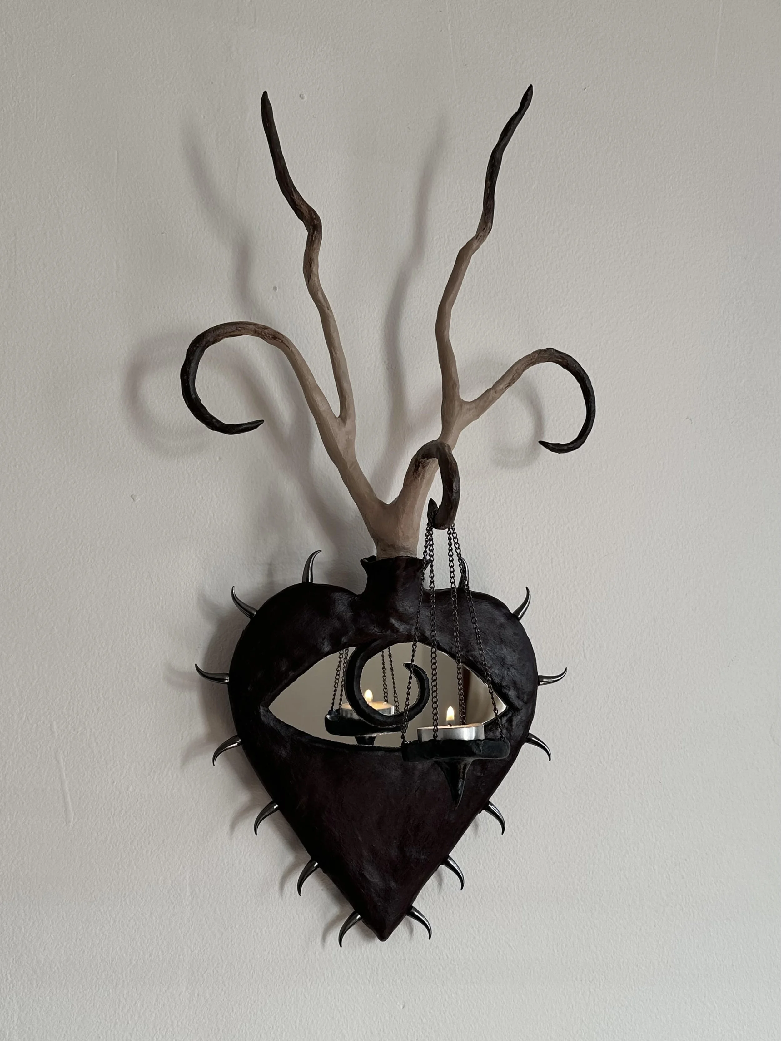 candle holder/mirror sculpted object. artist: gray flood