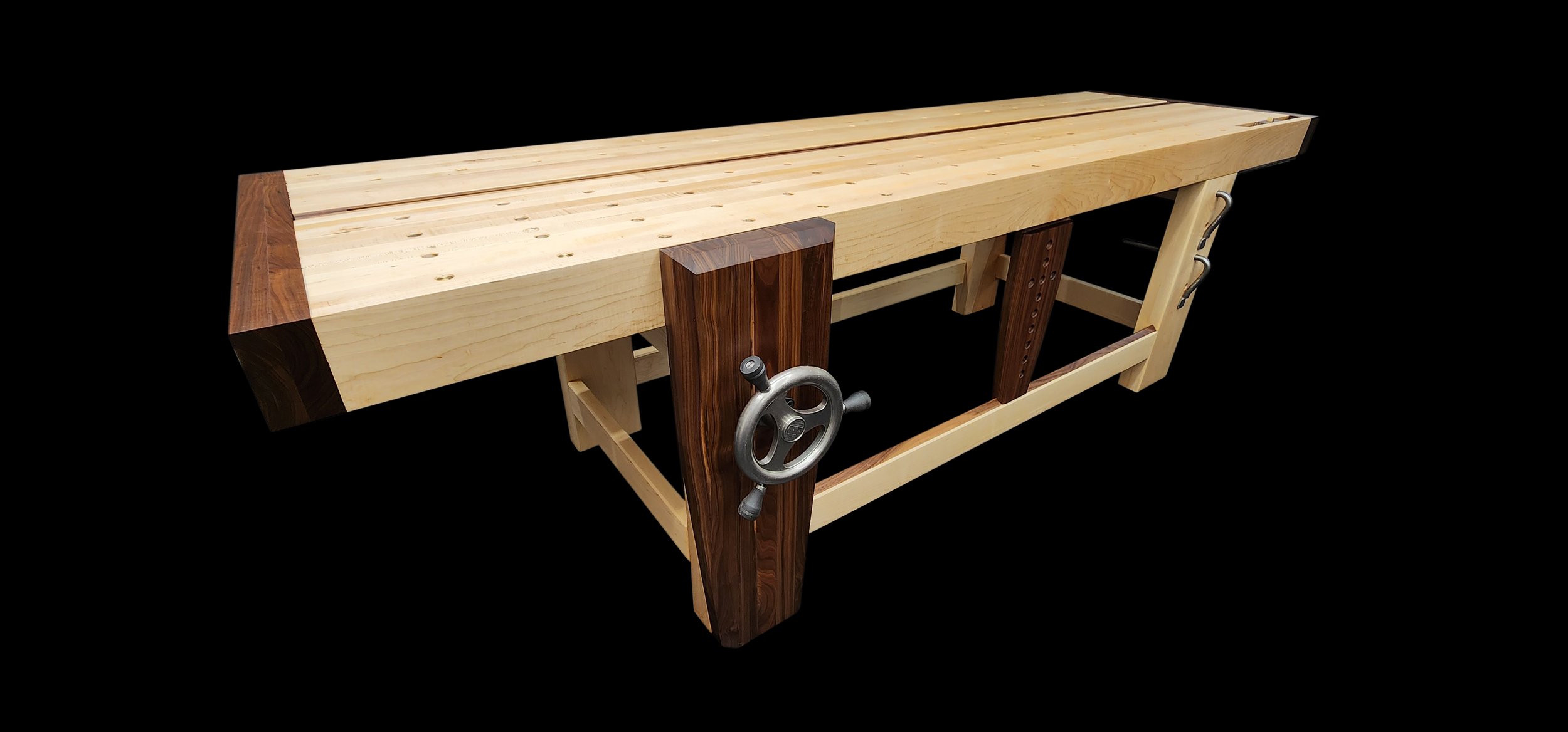 This is my custom Roubo Workbench. This is a time-tested design from the French craftsman Andre Roubo in the 1700's. It is still widely considered the best workbench design nearly 300 years later. This is one of the most critical tools in my shop bec