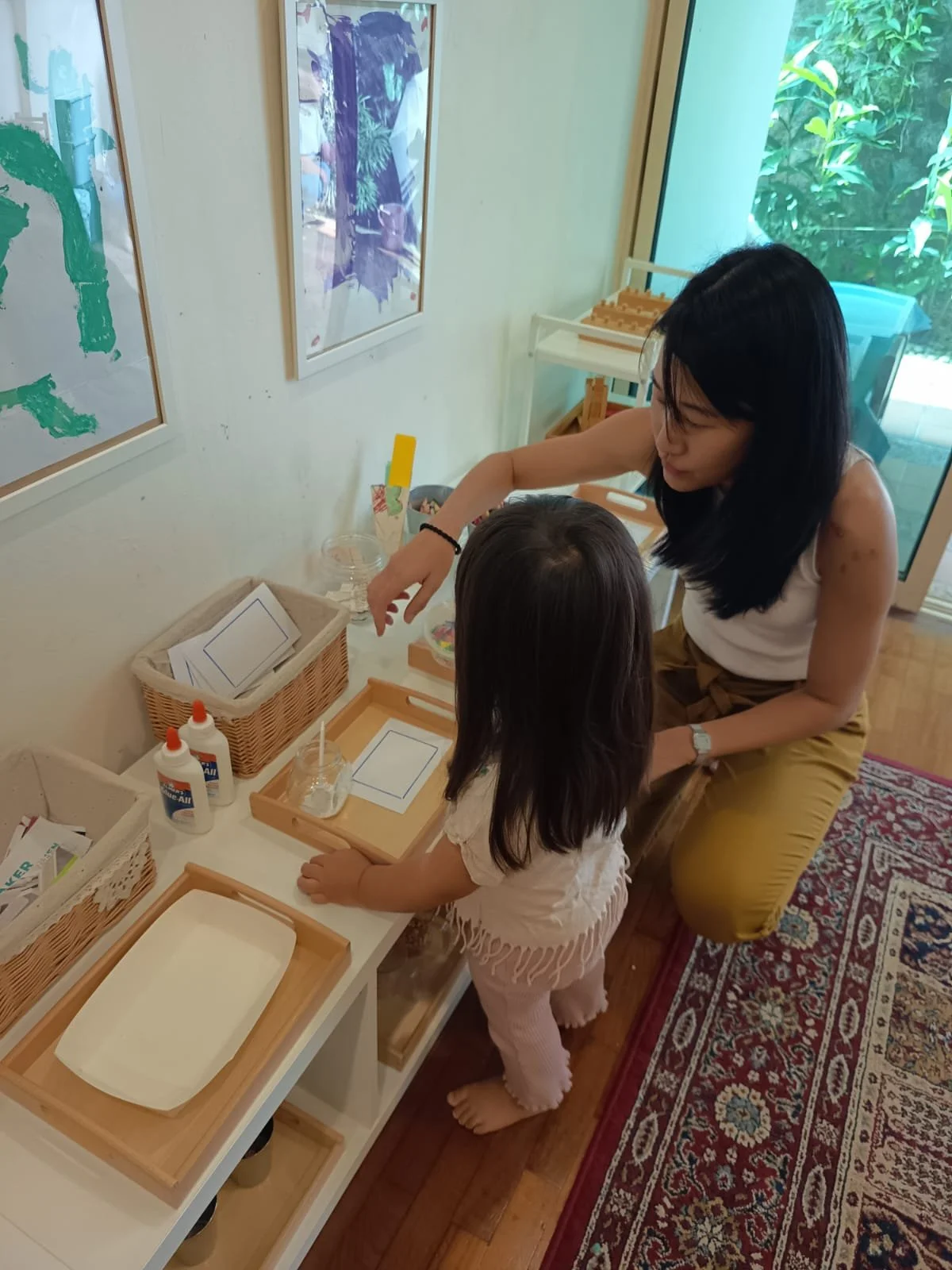 Helping Penny with pasting.jpeg