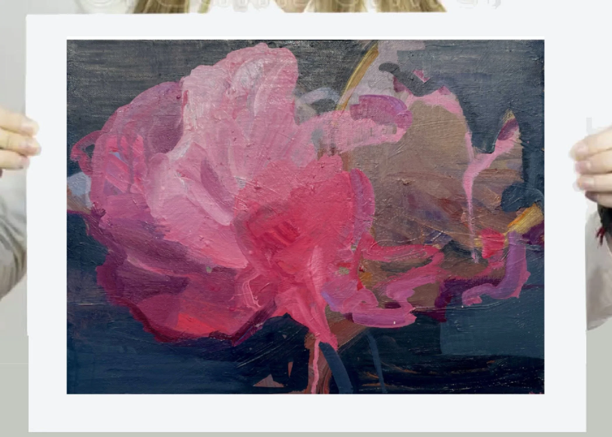 Close-up of a giclee print of an abstract pink and red flower painting with dark background.