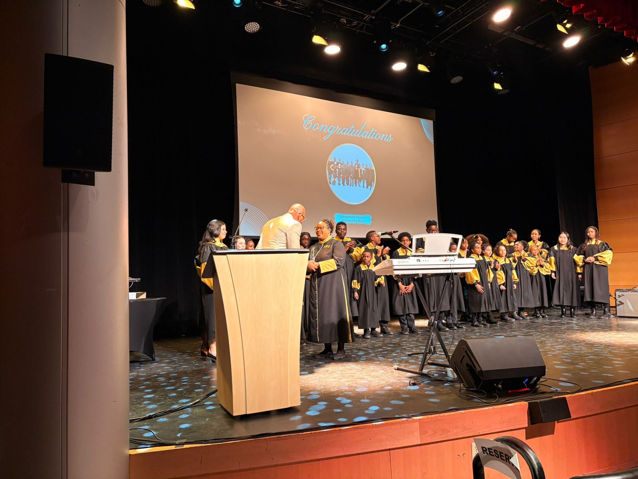 Director accepting the award.jpeg