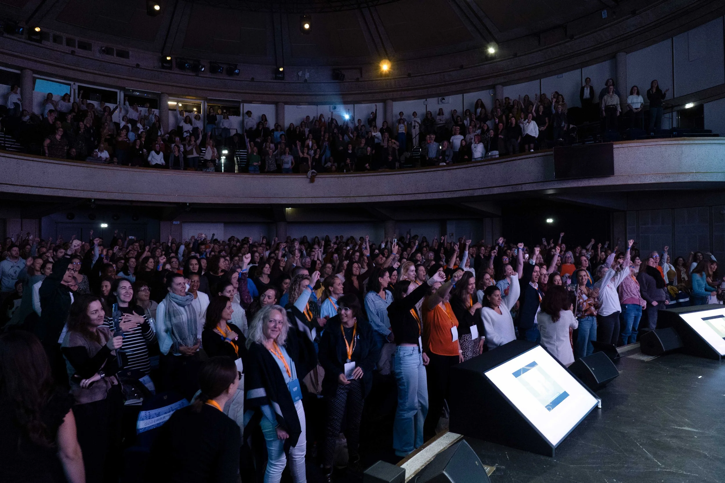 A modern backyard with a swimming pool, lounge chairs, trees, and a patio area with outdoor furniture.