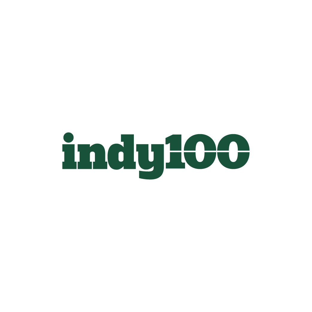 Black t-shirt with a logo featuring a paint roller and the text 'indyjoo' in dark green.
