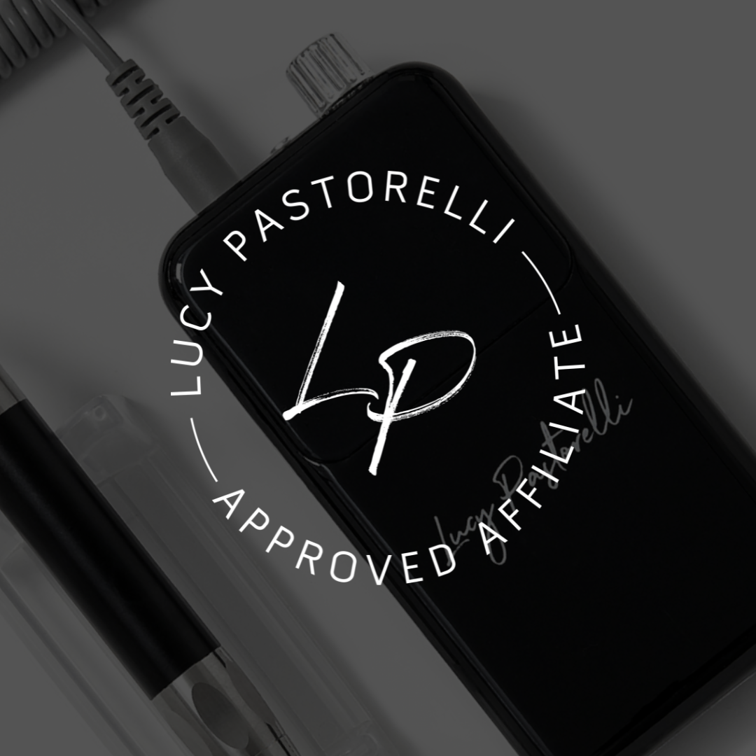 A smartphone with a logo on the screen that says 'Luca Pastorelli' with a circular stamp around it reading 'Approved Affiliate.' There is a pen and some other items nearby.