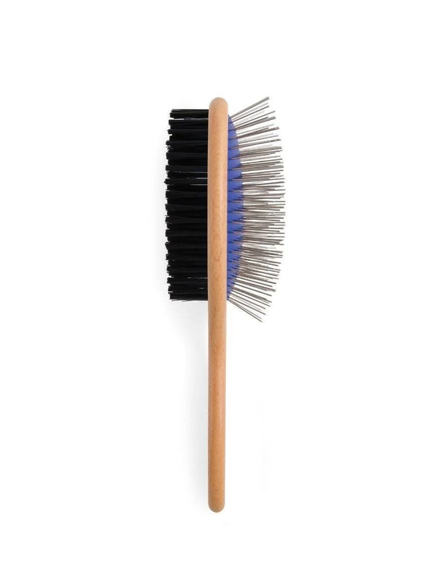 A cleaning brush with black bristles on the left side, metal wire bristles on the right side, and a wooden handle in the middle