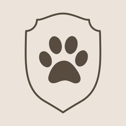 A shield with a paw print in the center.