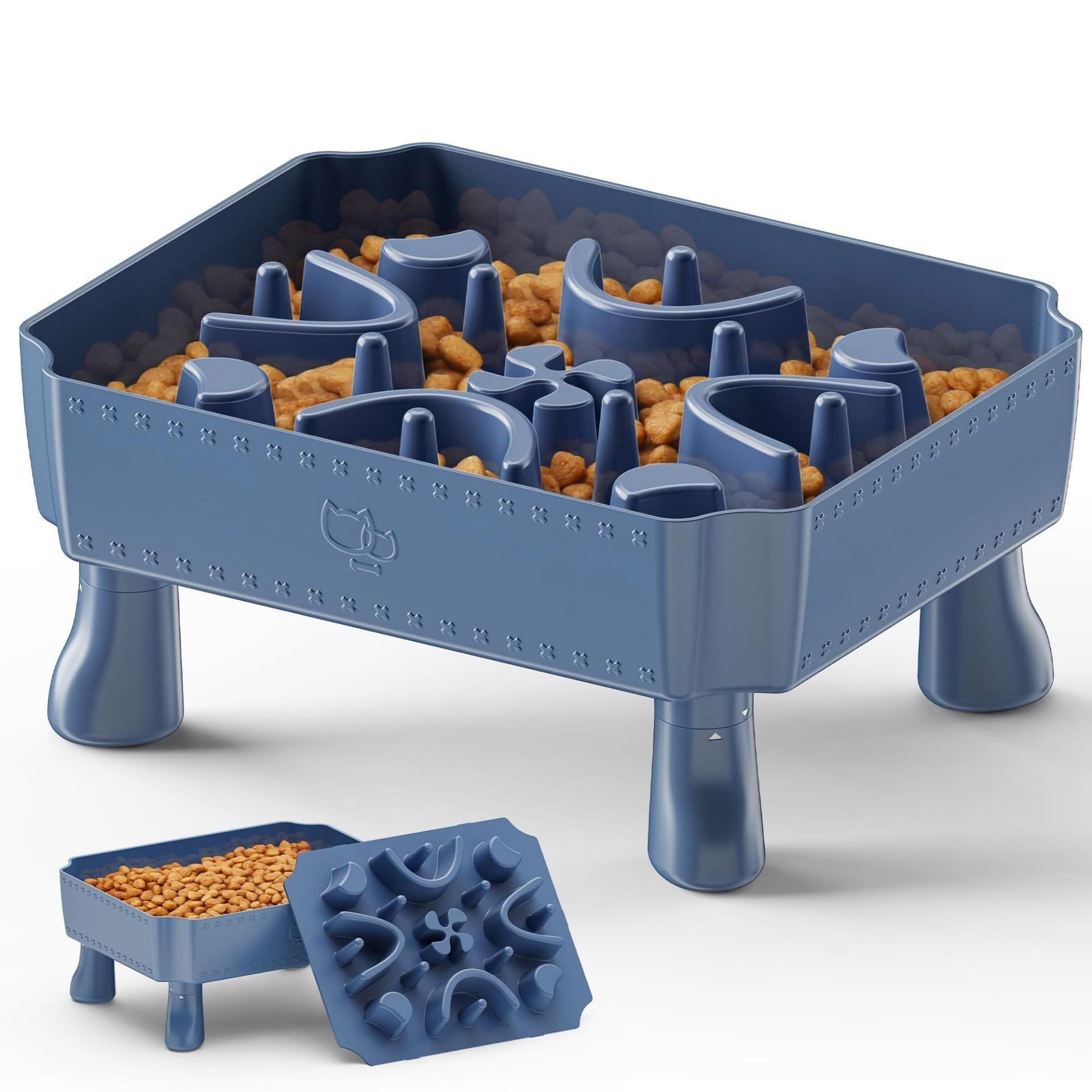 A blue pet food storage container with paw print design, filled with dry pet food, and a matching blue silicone dispensing lid and stand.