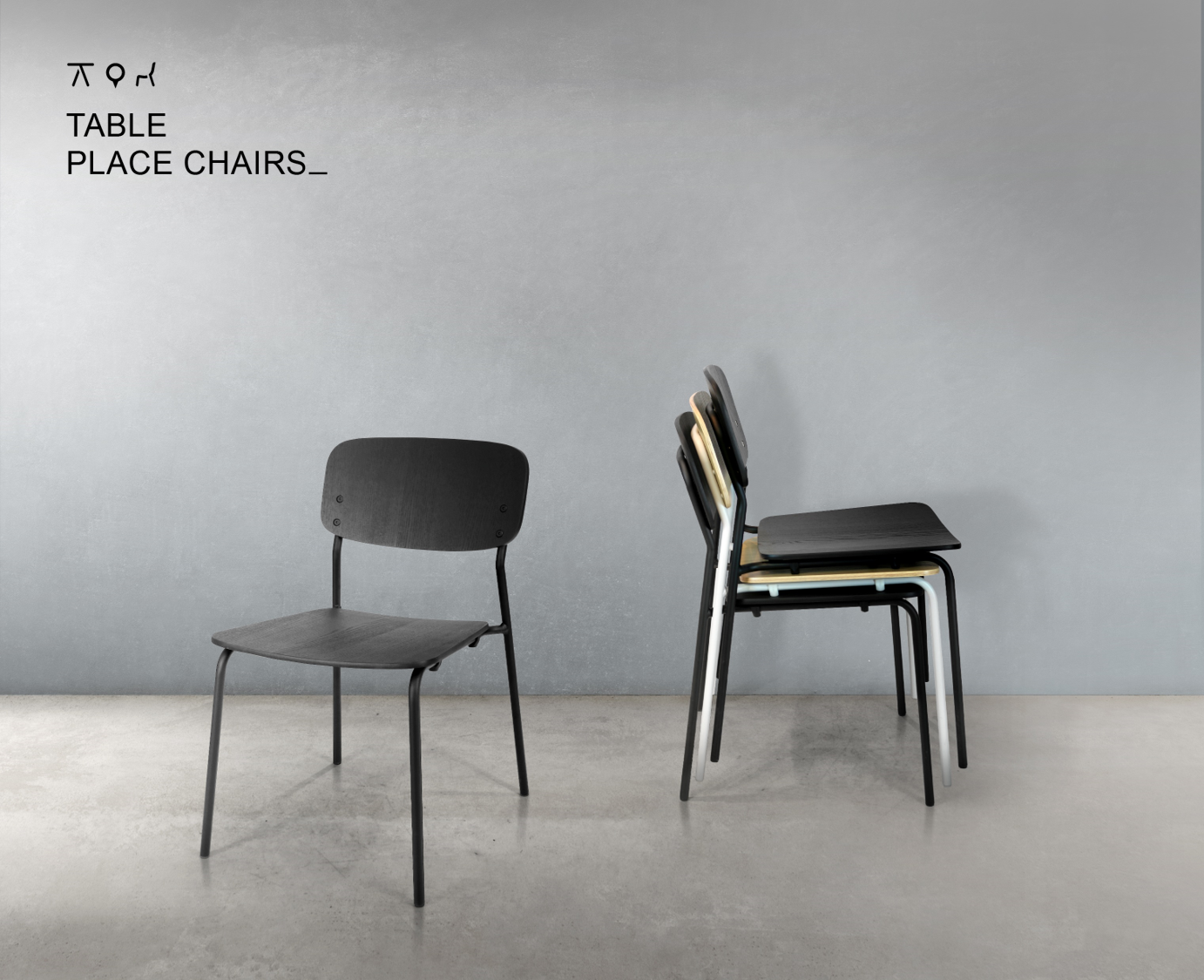 Several black and white chairs stacked against a plain gray wall, with some positioned in front of a small sign that reads 'Table' and 'Place Chairs'.