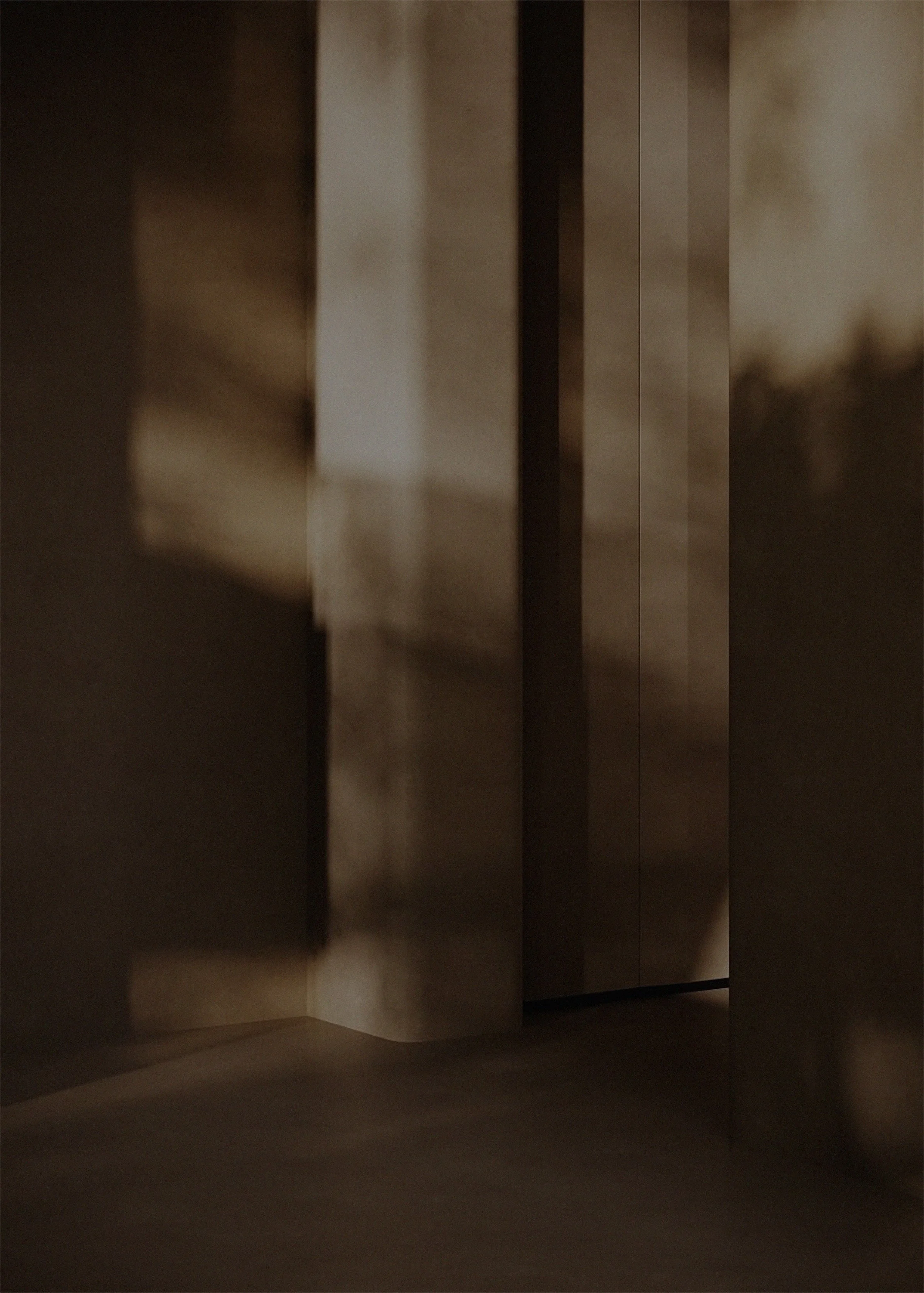 Abstract image of shadows and light on a modern, minimalistic wall with wooden panels.