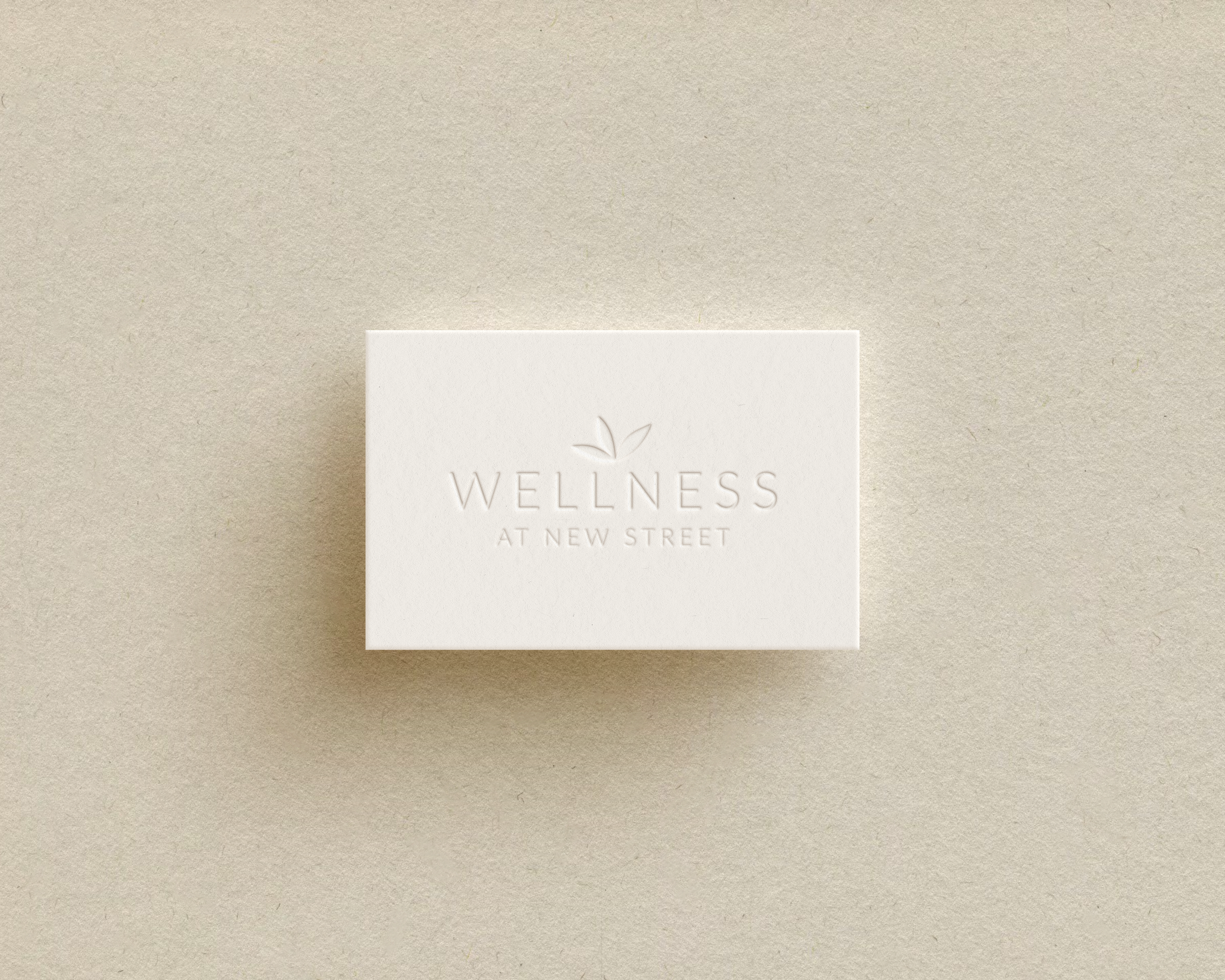 Branded business card featuring a clean design with logo, typography, and details for networking.
