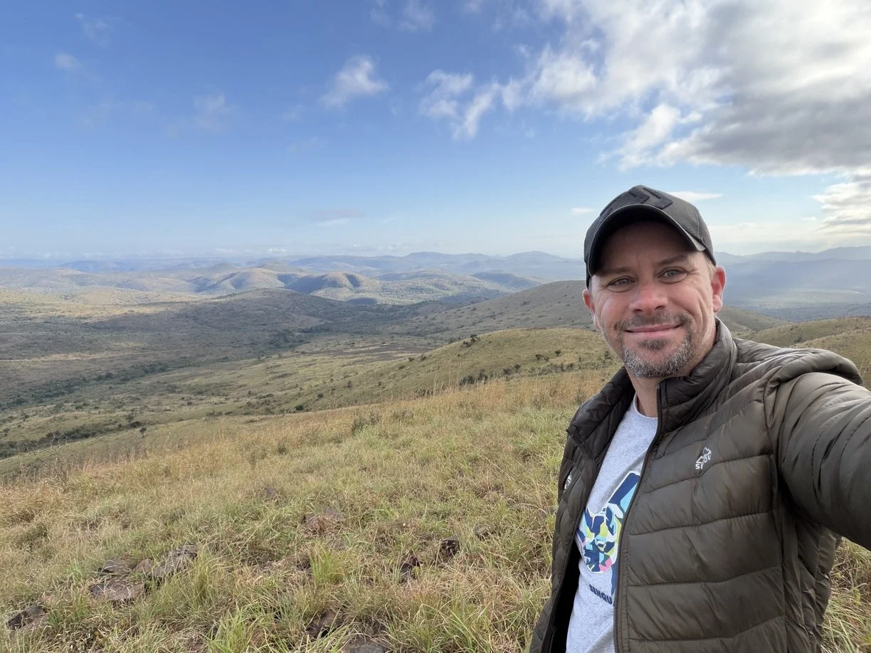 Shaun Ritson overlooking the Makongo Hills Mountains while exploring South Africa's scenic landscapes.