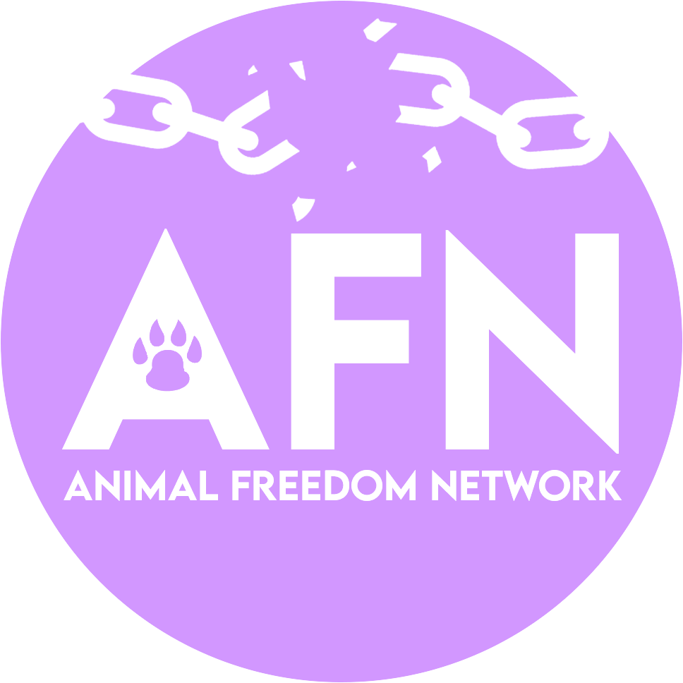Purple circular logo for Animal Freedom Network with white text and graphics, featuring broken chains and a paw print within the letter A.
