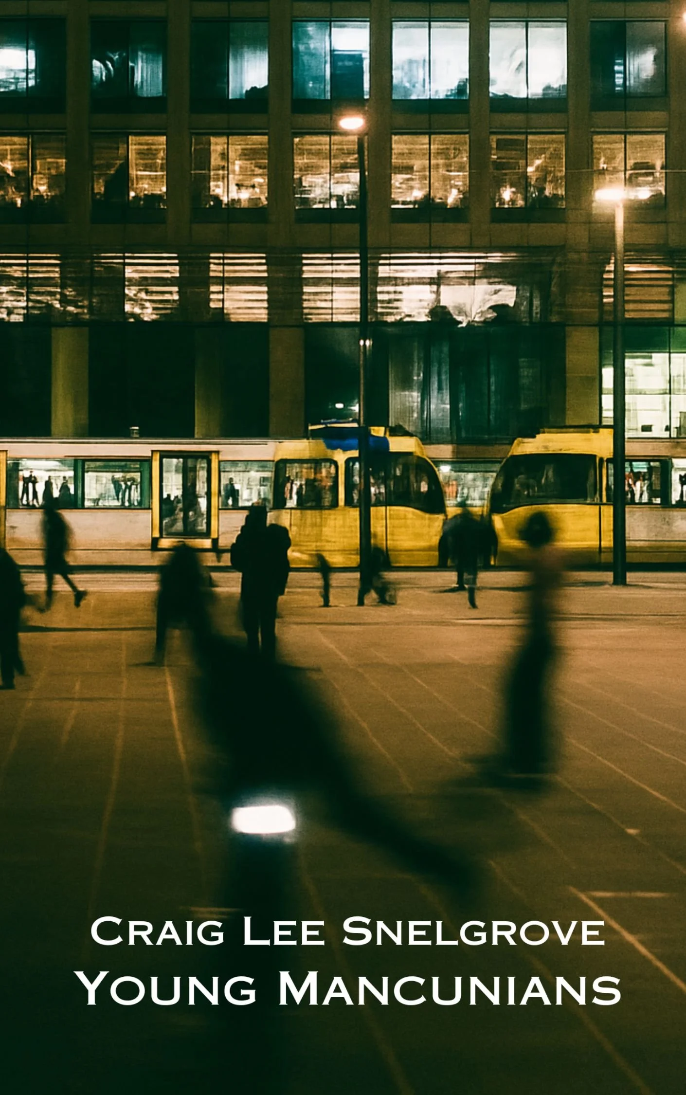 Nighttime scene of a city plaza with blurred pedestrians in motion, a modern glass building with illuminated interior, and a yellow tram passing by.