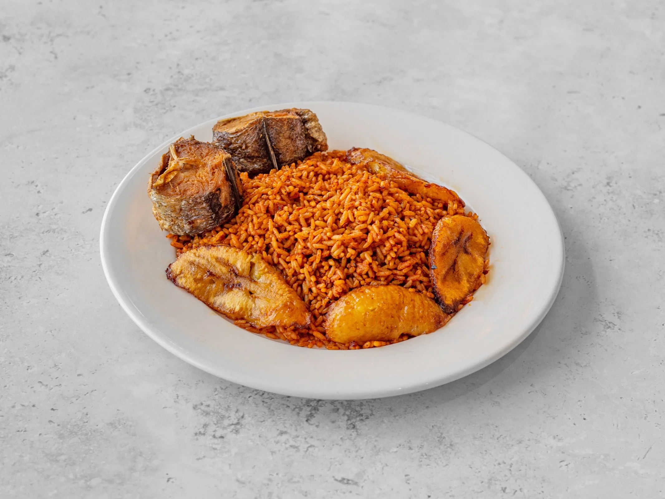 42749_SilverSpoonKitchen_Food_jollofRiceWithFishAndPlantain (1).jpg
