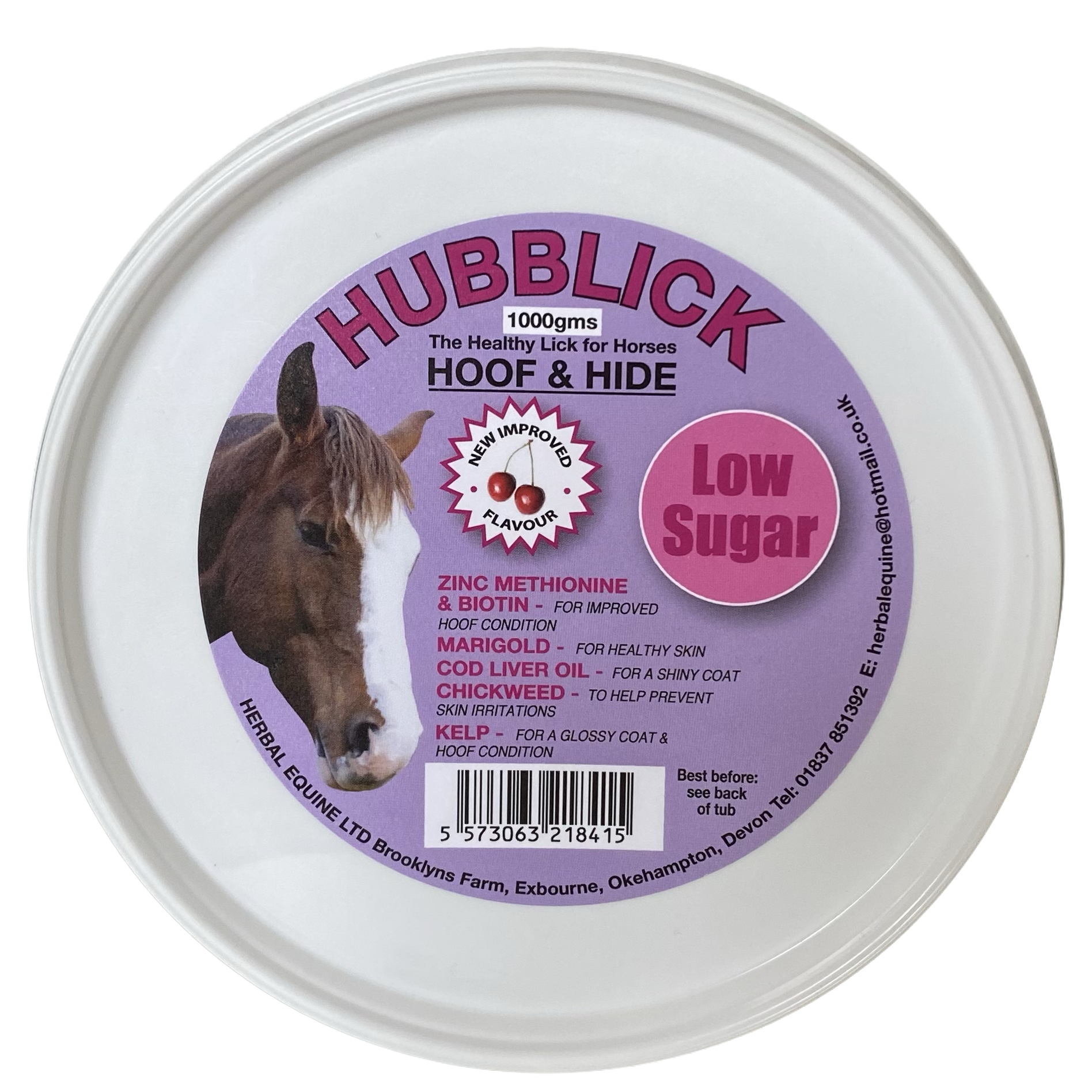 Close-up of a tub of Hubbleick horse lick with a purple label, featuring a horse's head and listings of ingredients like zinc methionine, biotin, marigold, cod liver oil, chickweed, and kelp, and a pink circle indicating low sugar content.