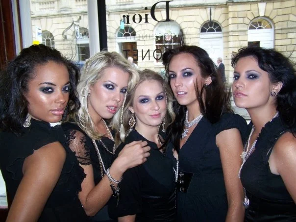 The wonderful Jollys Bath team posing hard for a theme day