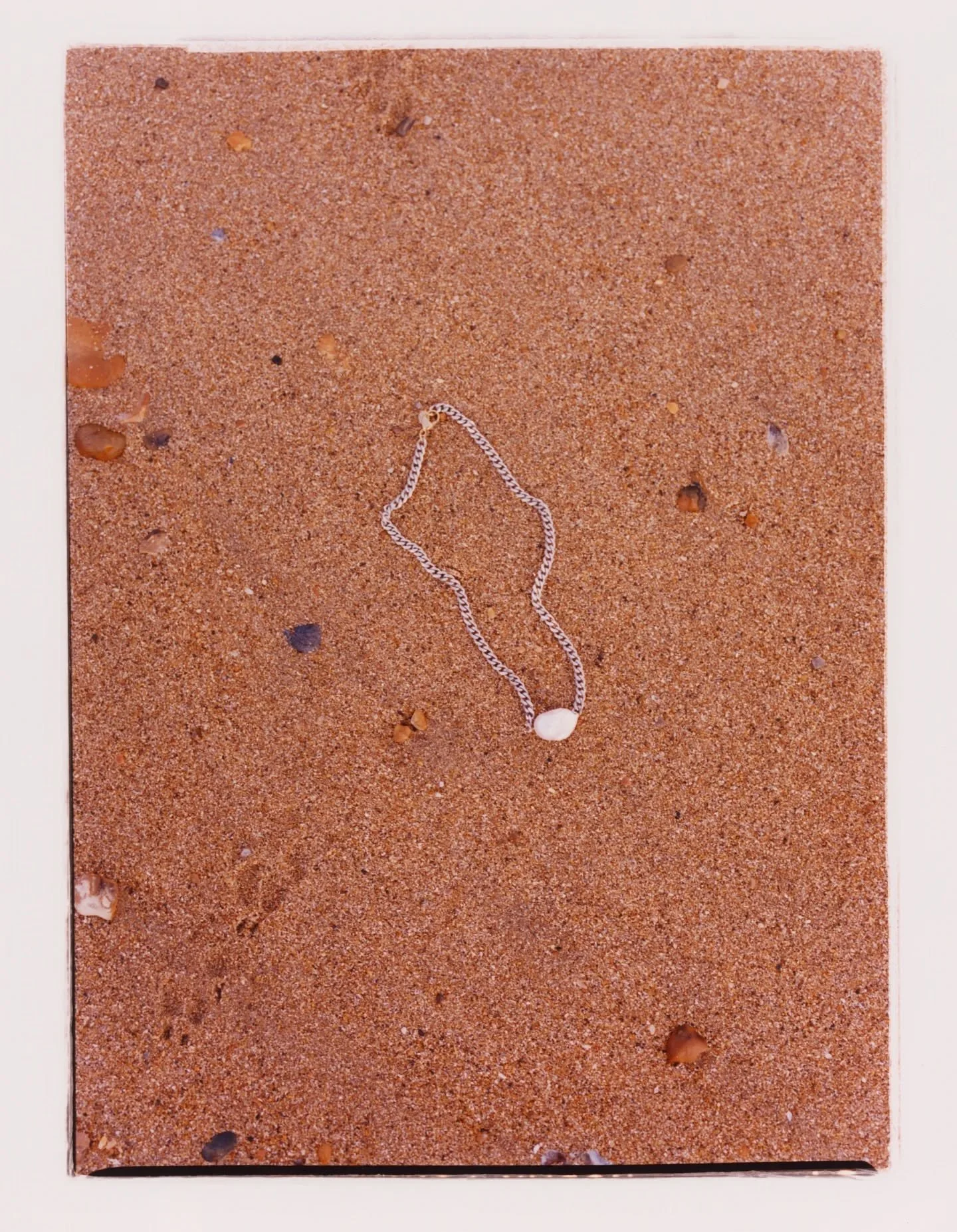 Spending time by the ocean capturing @ugnesstory necklace on film.

Shot on Portra and darkroom printed 🌊 🦪