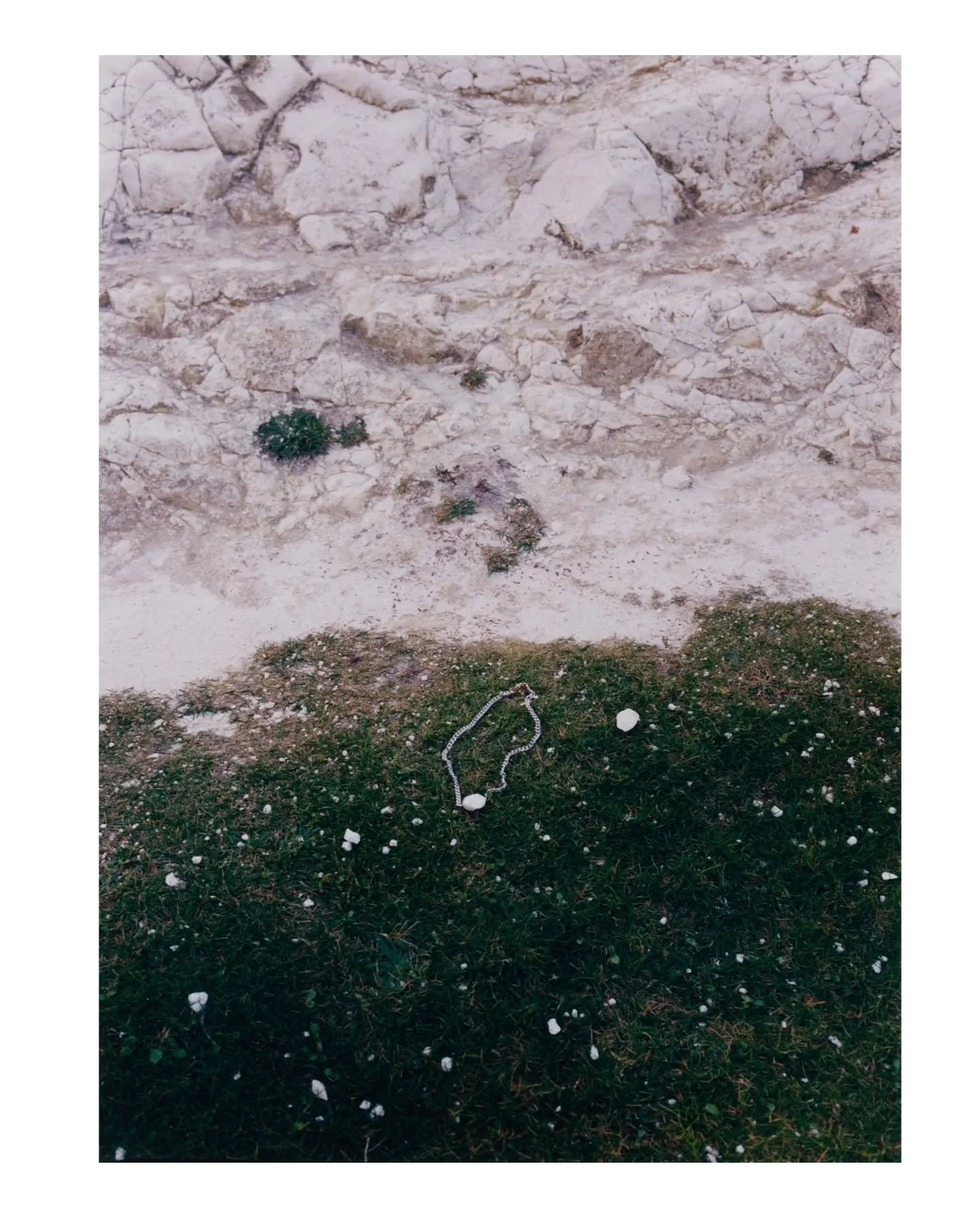 A recent trip to the White Cliffs of Dover 

I noticed the chalk crumbling onto the grass, scattered like tiny pearls.

Placing this beautiful pearl necklace by @ugnesstory there felt like finding a small treasure within nature &mdash; something deli