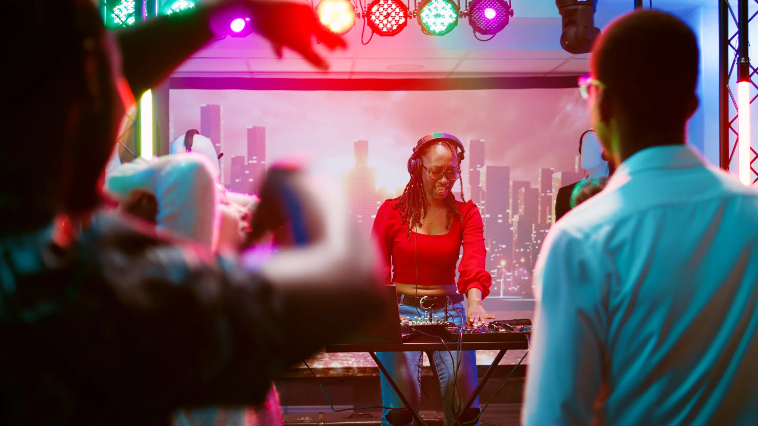 Female DJ performing live during an immersive DJ experience in Las Vegas.