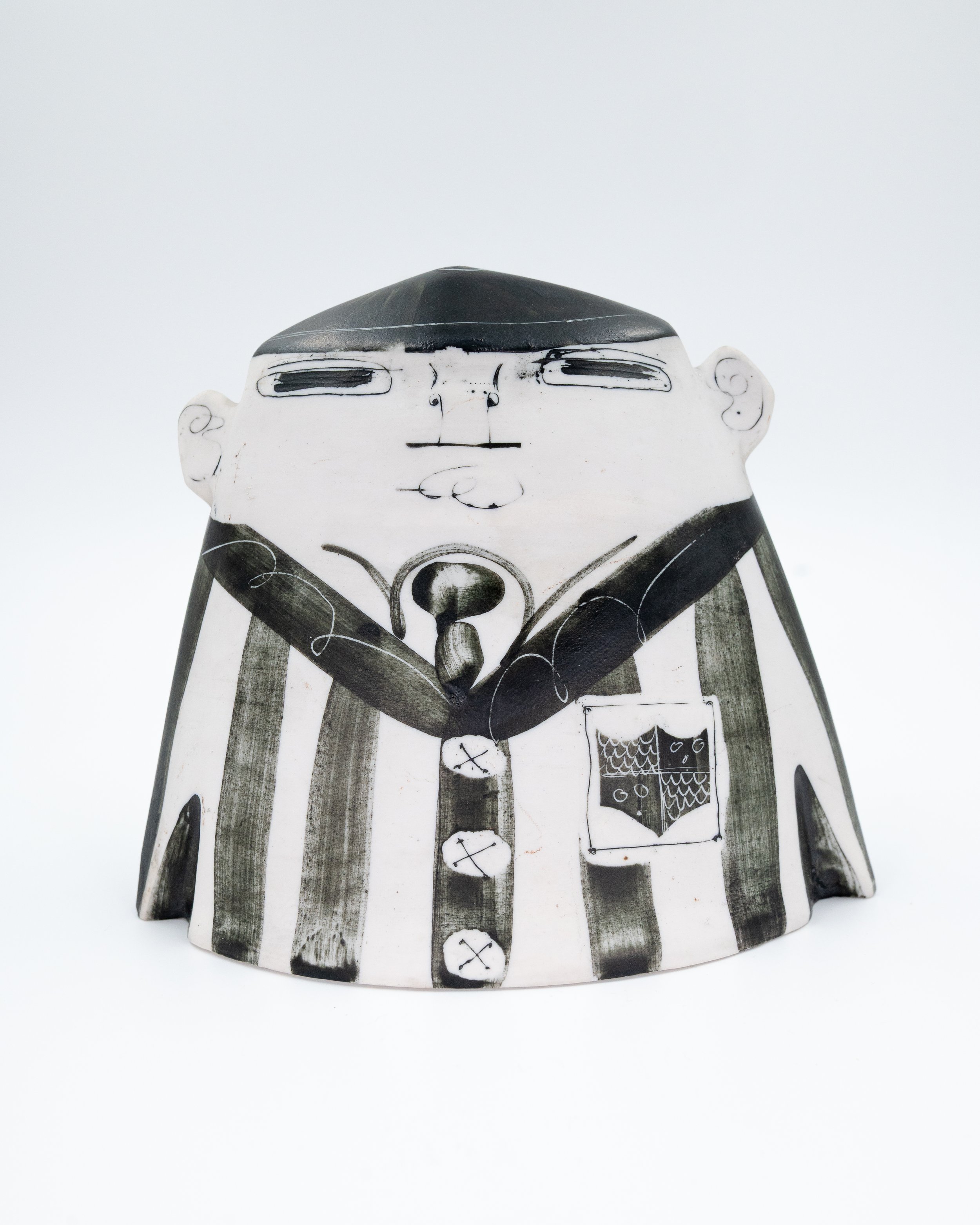 A Richard Parkinson Pottery model of a schoolboy designed by Susan Parkinson