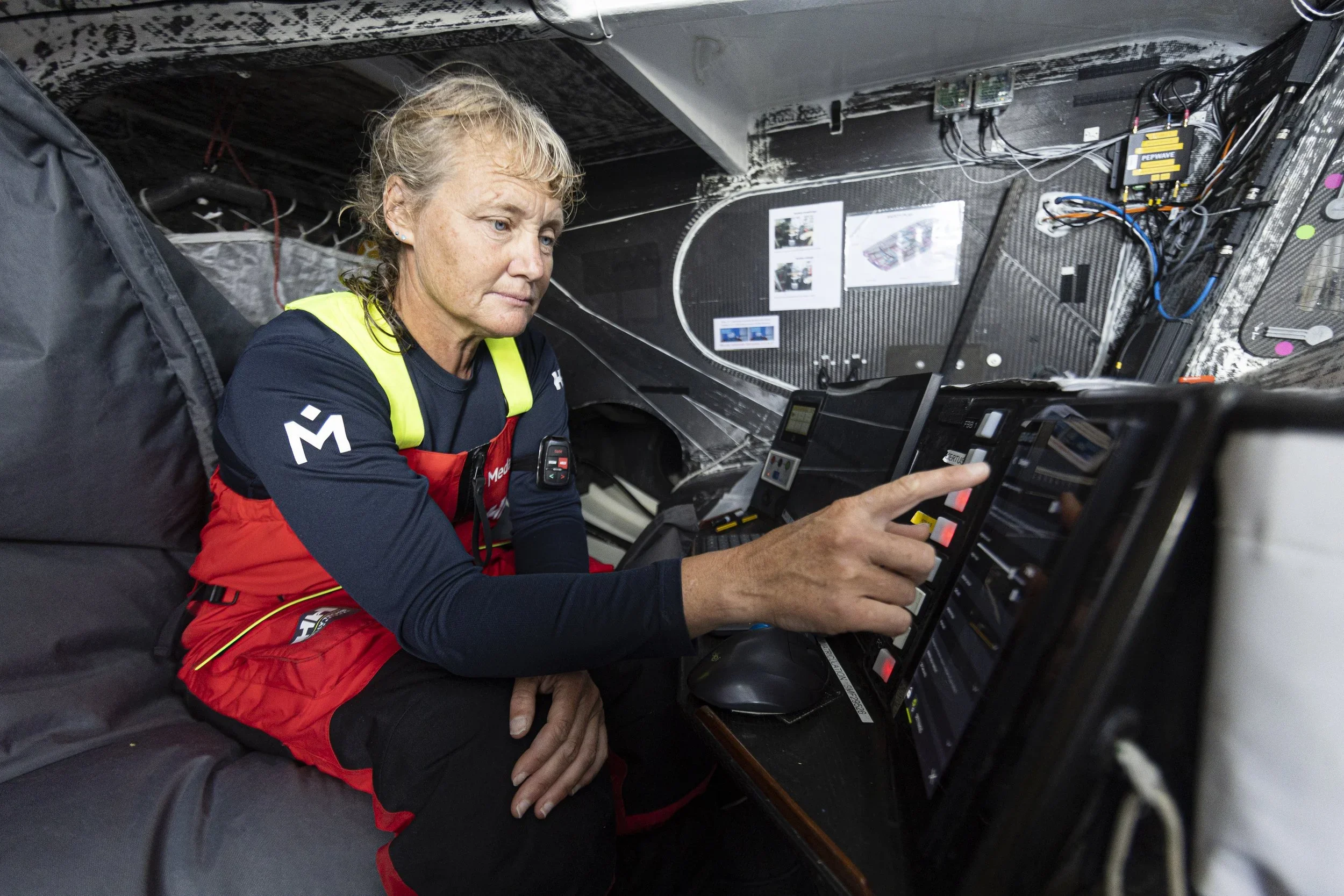 Onboard IMOCA 60 ft foiling racing boat, Pip Hare using electronics